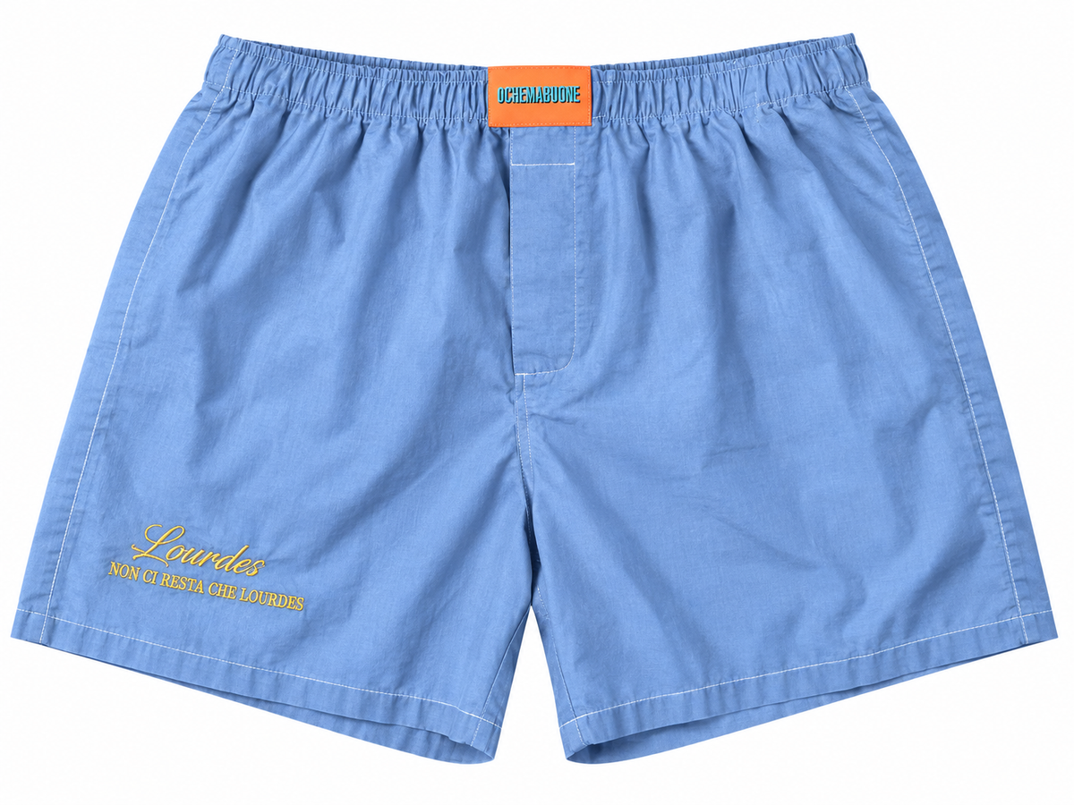 Boxer azzurro con ricamo NON CI RESTA CHE LOURDES su sfondo bianco
